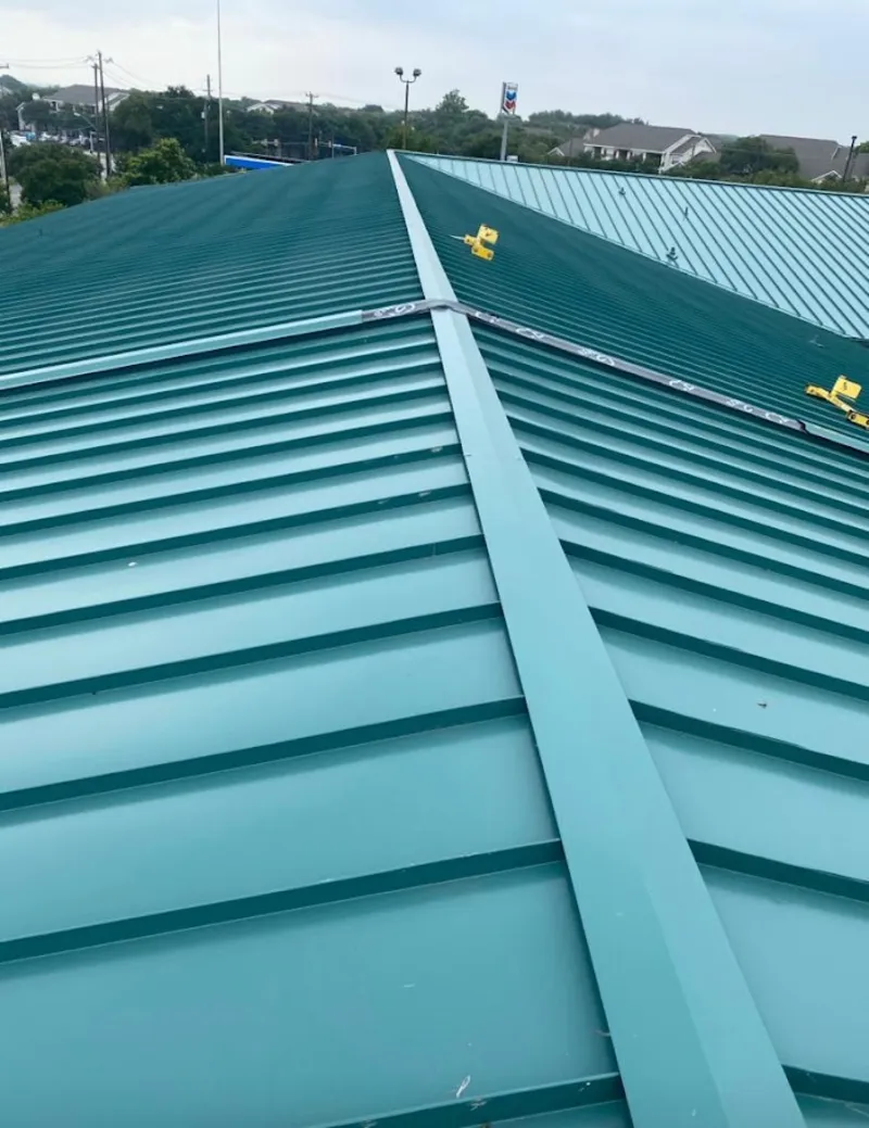 Green commercial metal roof ridge and valley for Metal Roof Repair in Harrah