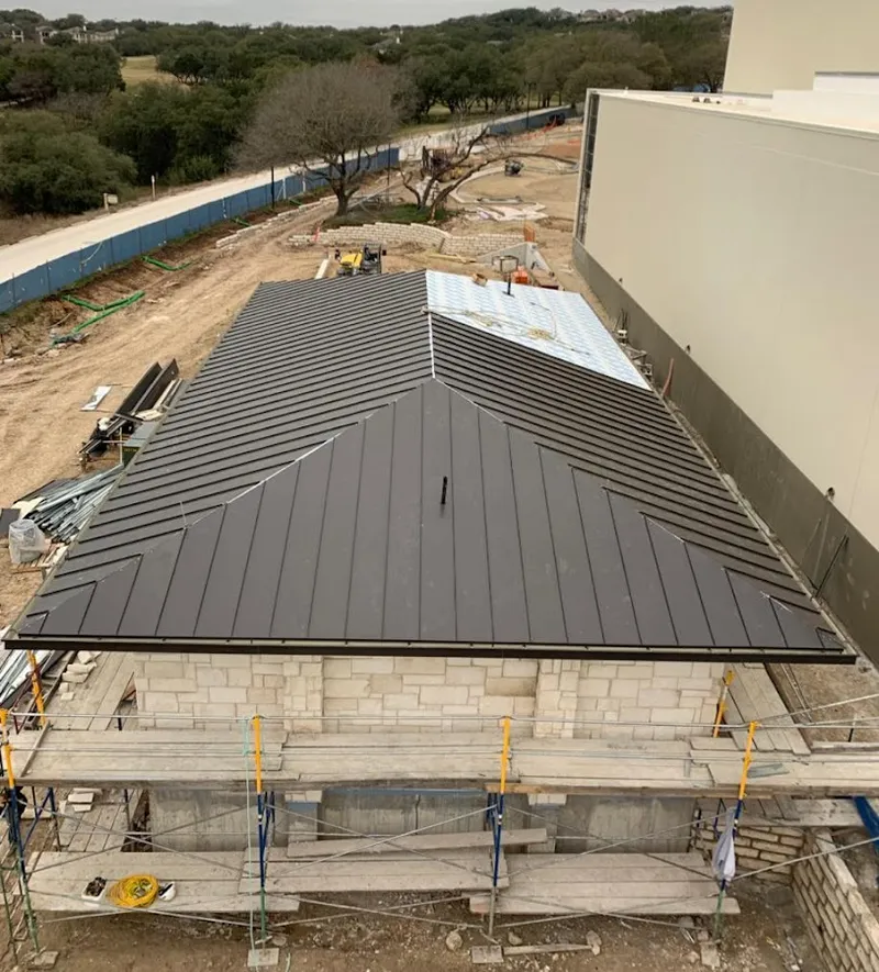 Metal roof new construction with scaffolding in Harrah