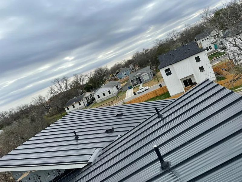 Standing seam metal roof panels with vents for Skylight Repair in Harrah